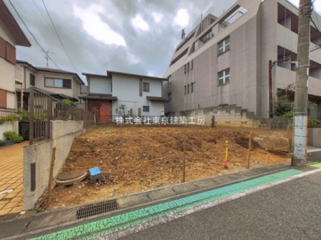 �@-